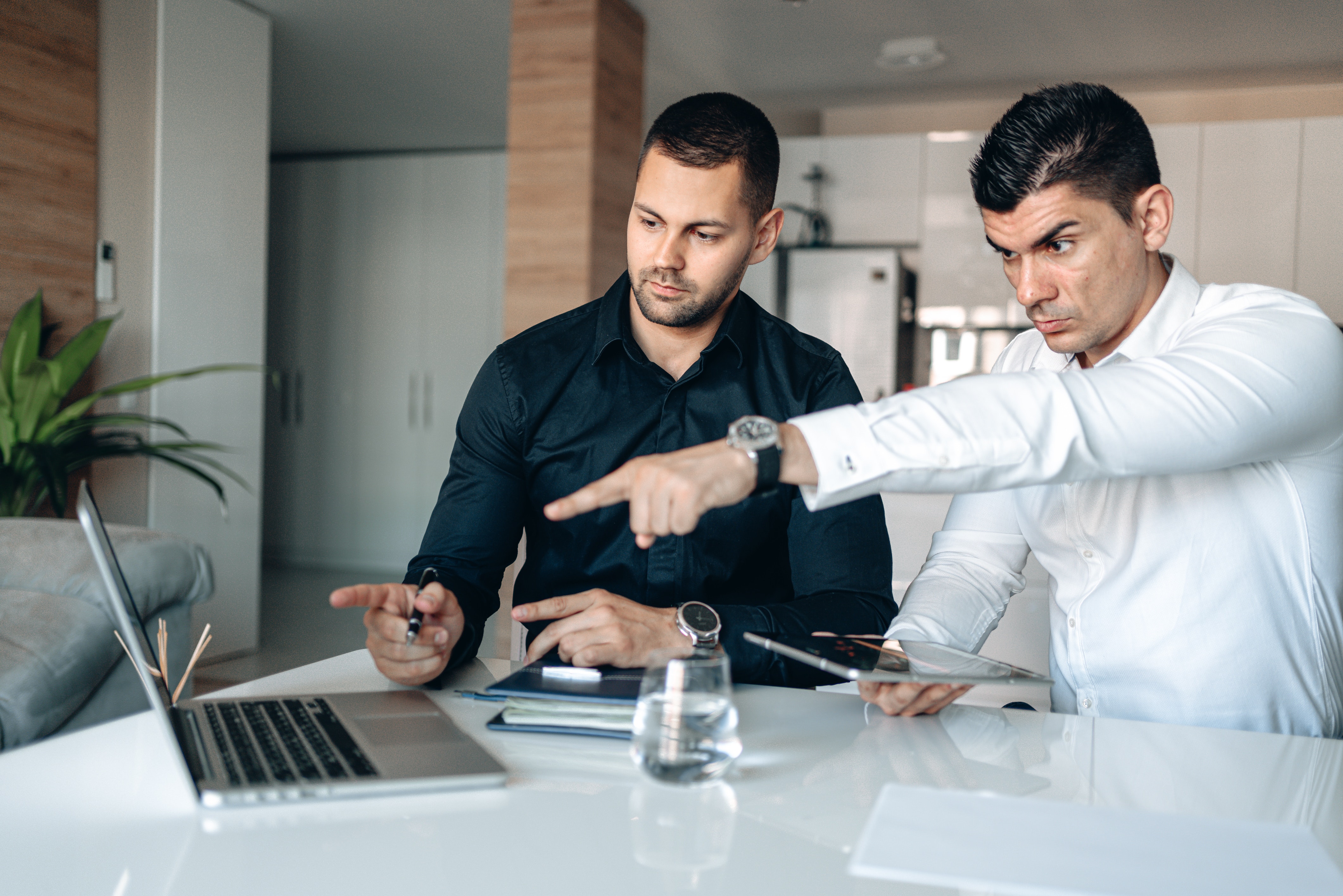 What Are the Pros and Cons of Wix Website Builder for Your Business? Two Men on Computer - Build Your Online Business With Wix Website Builder